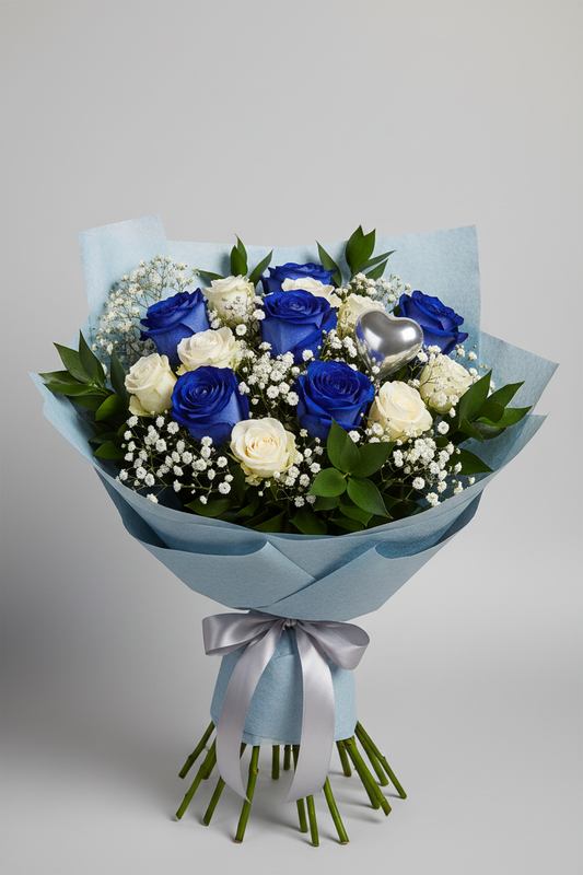 Blue roses and white spray roses with gypsophila and ruscus in pale blue wrapping with silver heart balloon